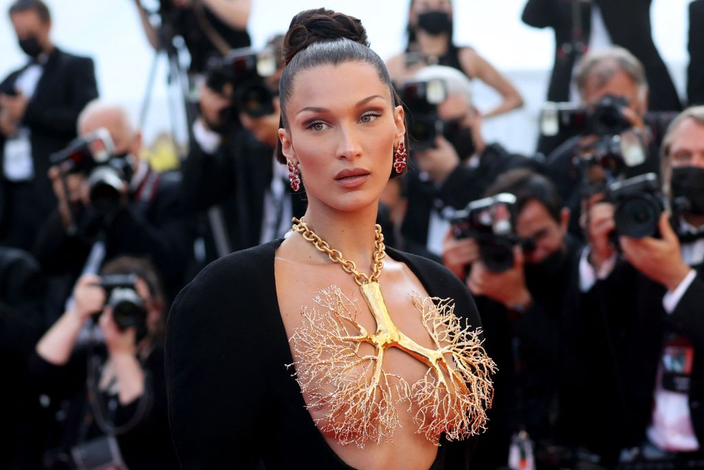 US model Bella Hadid poses as she arrives for the screening of the film "Tre Piani" (Three Floors) at the 74th edition of the Cannes Film Festival in Cannes, southern France, on July 11, 2021. (Photo by Valery HACHE / AFP) (Photo by VALERY HACHE/AFP via Getty Images)
