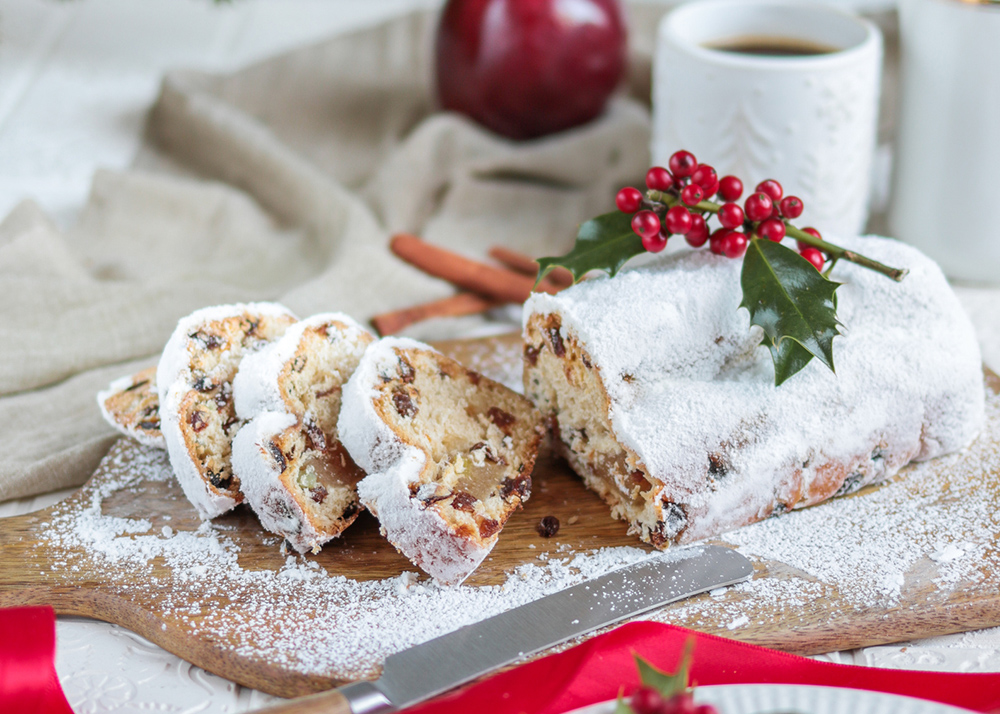 Traditional Christmas Stollen festive pastry cake with coffee