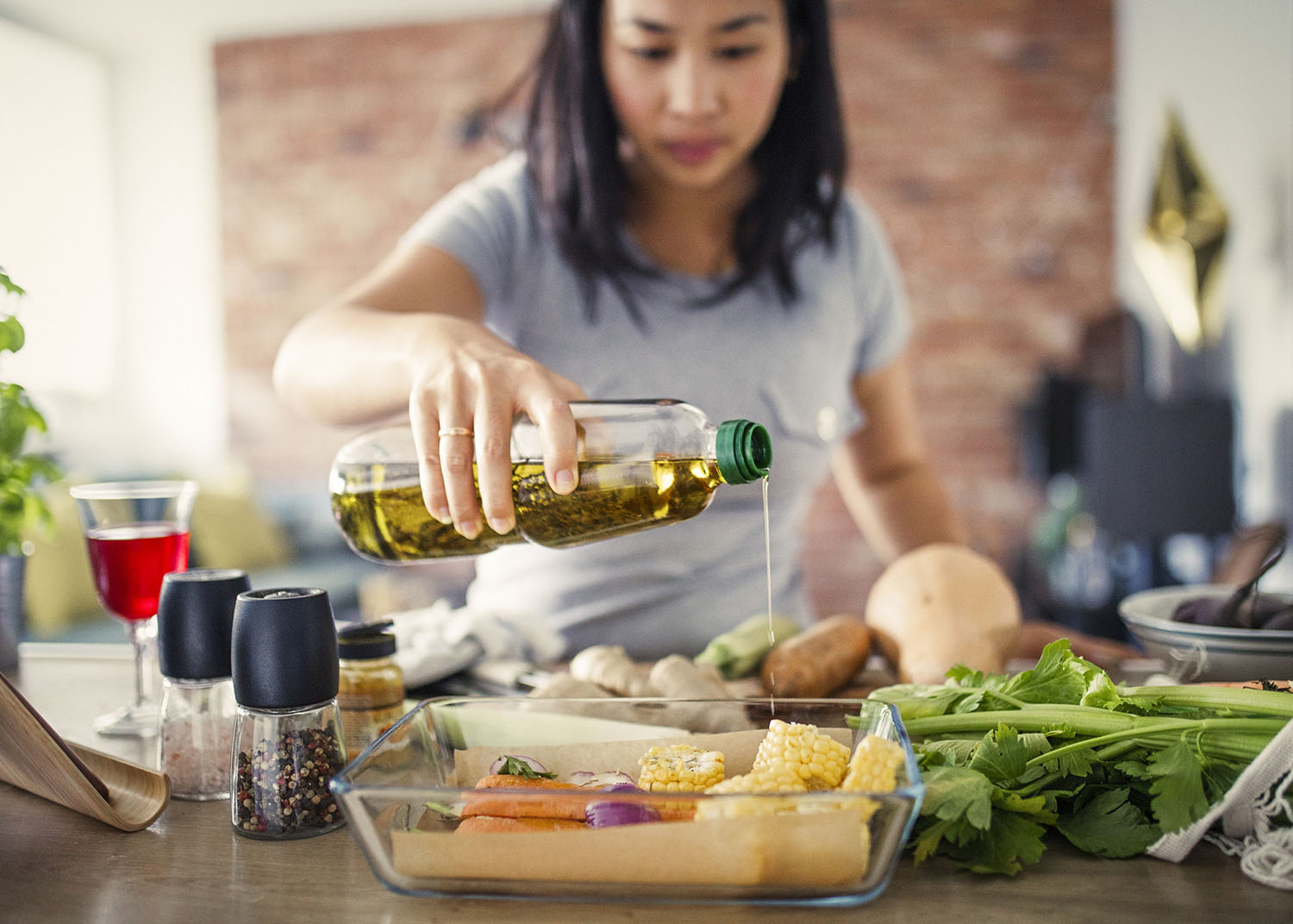 Asian women at home making healthy meal