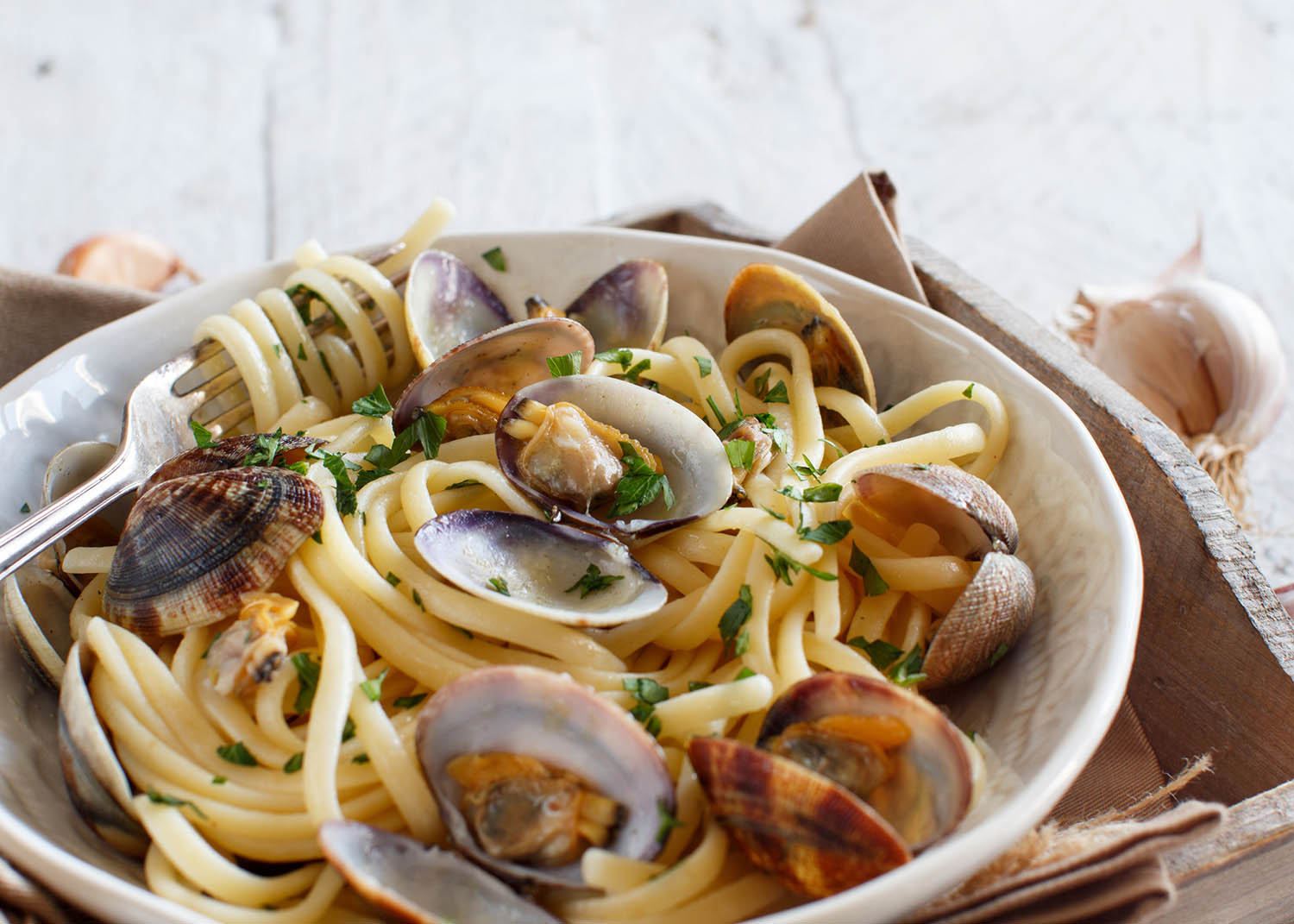 Linguini with clams top view - Traditional italian seafood pasta