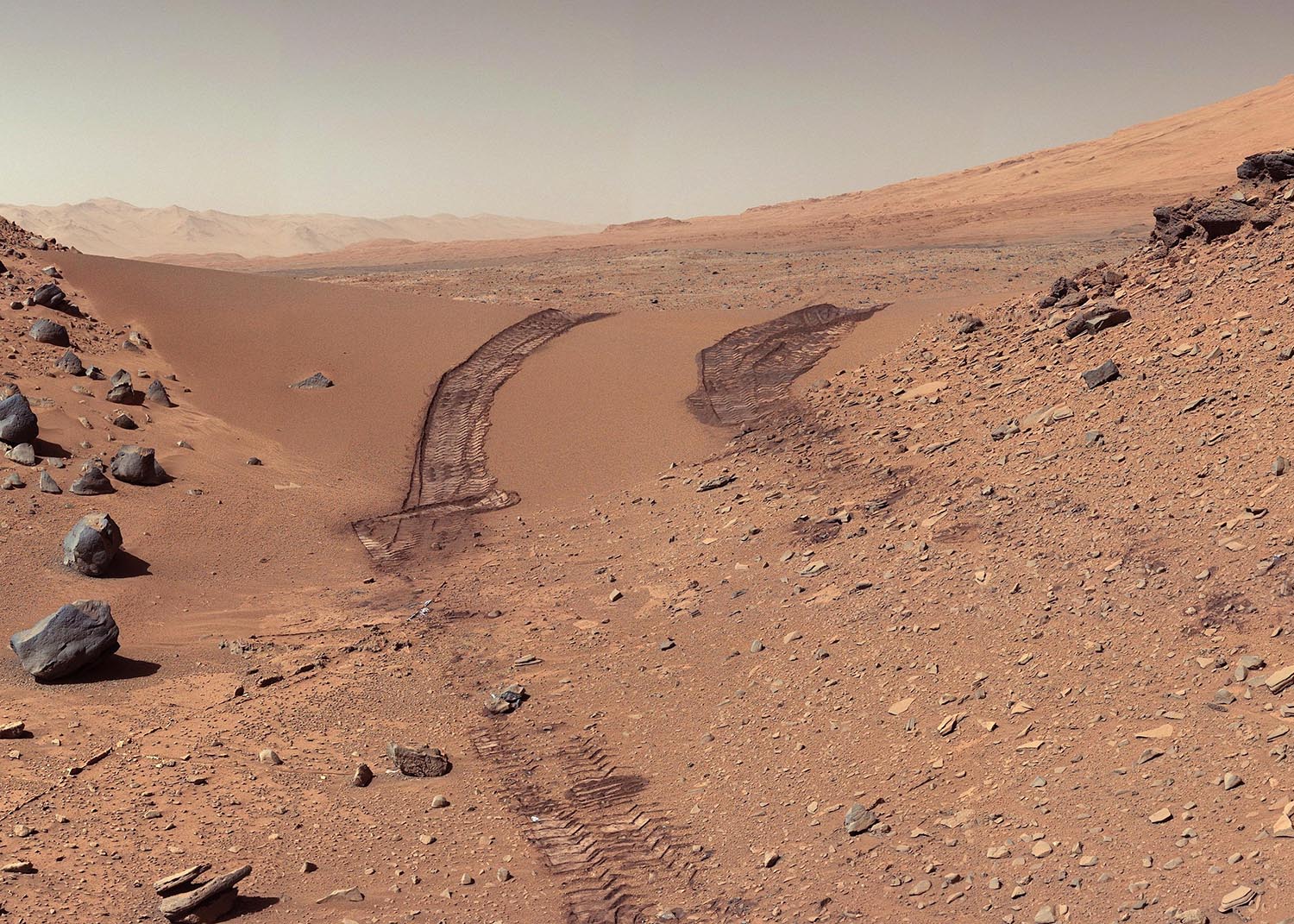 Landscape on Planet Mars. Rover after crossing a dune. Elements of this picture furnished by NASA.