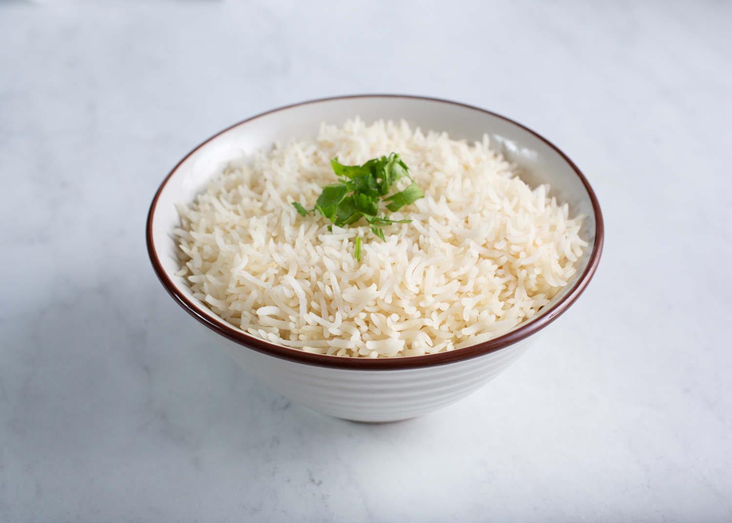 A view of a bowl of basmati rice.