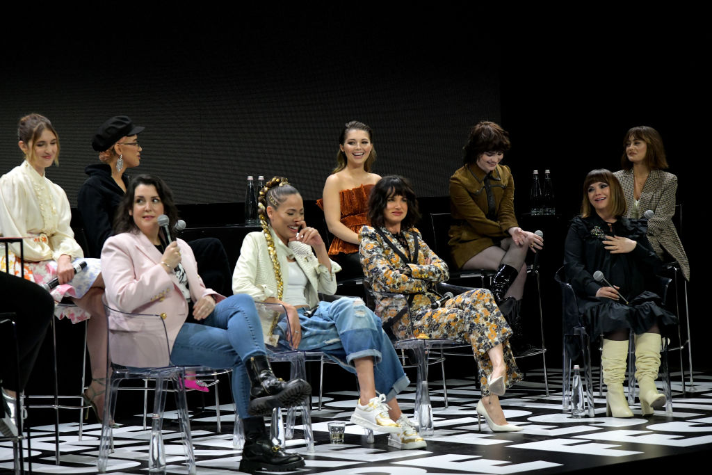 LOS ANGELES, CALIFORNIA - NOVEMBER 13: (L-R) Sophie NÃ©lisse, Melanie Lynskey, Jasmin Savoy Brown, Tawny Cypress, Juliette Lewis, Samantha Hanratty, Sophie Thatcher, Christina Ricci, and Ella Purnell speak during A Sneak Peek at YELLOWJACKETS, Presented by SHOWTIMEÂ® at Vulture Festival 2021 at The Hollywood Roosevelt on November 13, 2021 in Los Angeles, California. (Photo by Charley Gallay/Getty Images for Vulture)