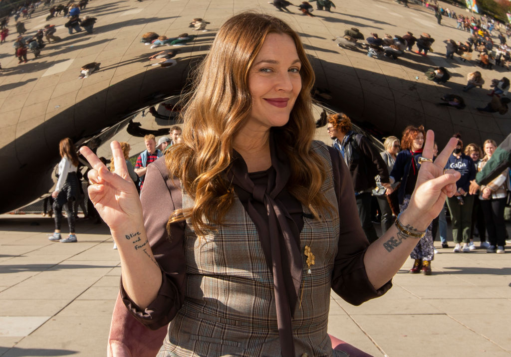 CHICAGO, ILLINOIS - NOVEMBER 07: Host Drew Barrymore films a special segment for "The Drew Barrymore Show" in downtown Chicago in front of the Cloud Gate statue, known as the "Bean", in Millennium Park on November 7, 2021 in Chicago, Illinois. (Photo by Barry Brecheisen/Getty Images)