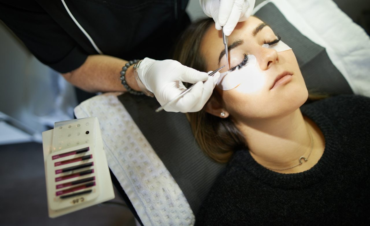 Cropped shot of a young woman getting eyelash extensions