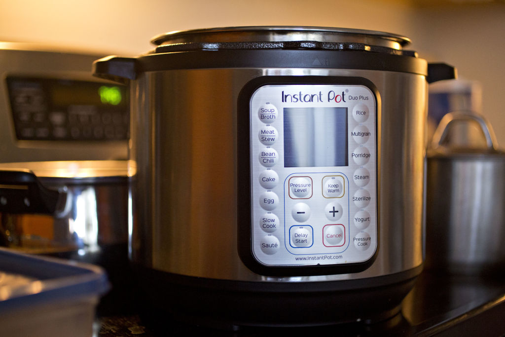 An Instant Brands Inc. Instant Pot is arranged for a photograph in Arlington, Virginia, U.S., on Tuesday, March 5, 2019. Corelle Brands LLC, the maker of Pyrex and CorningWare kitchen products, agreed to merge with Instant Brands, the company behind the popular Instant Pot cooker. Photographer: Andrew Harrer/Bloomberg via Getty Images