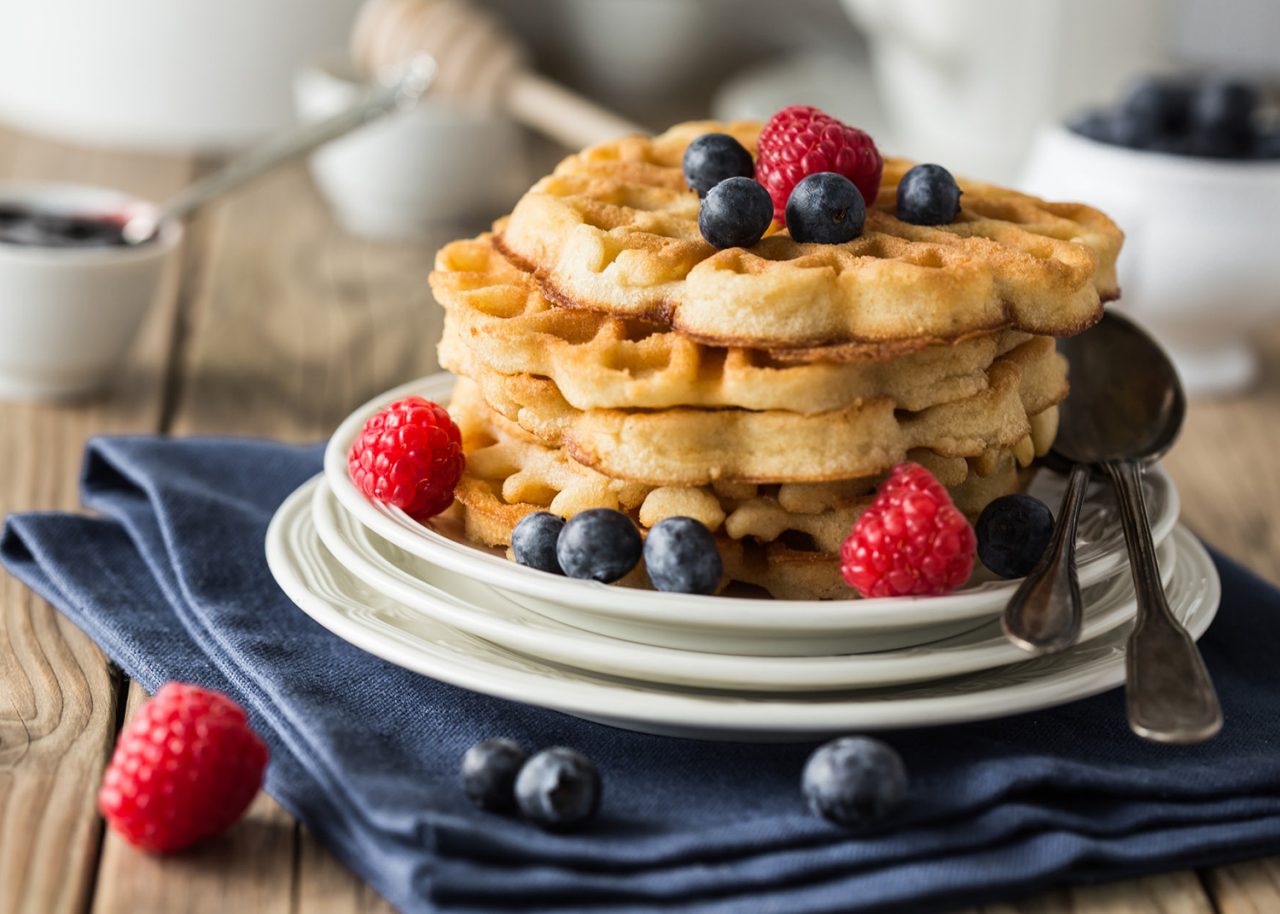 Blueberry waffles with raspberries for breakfast