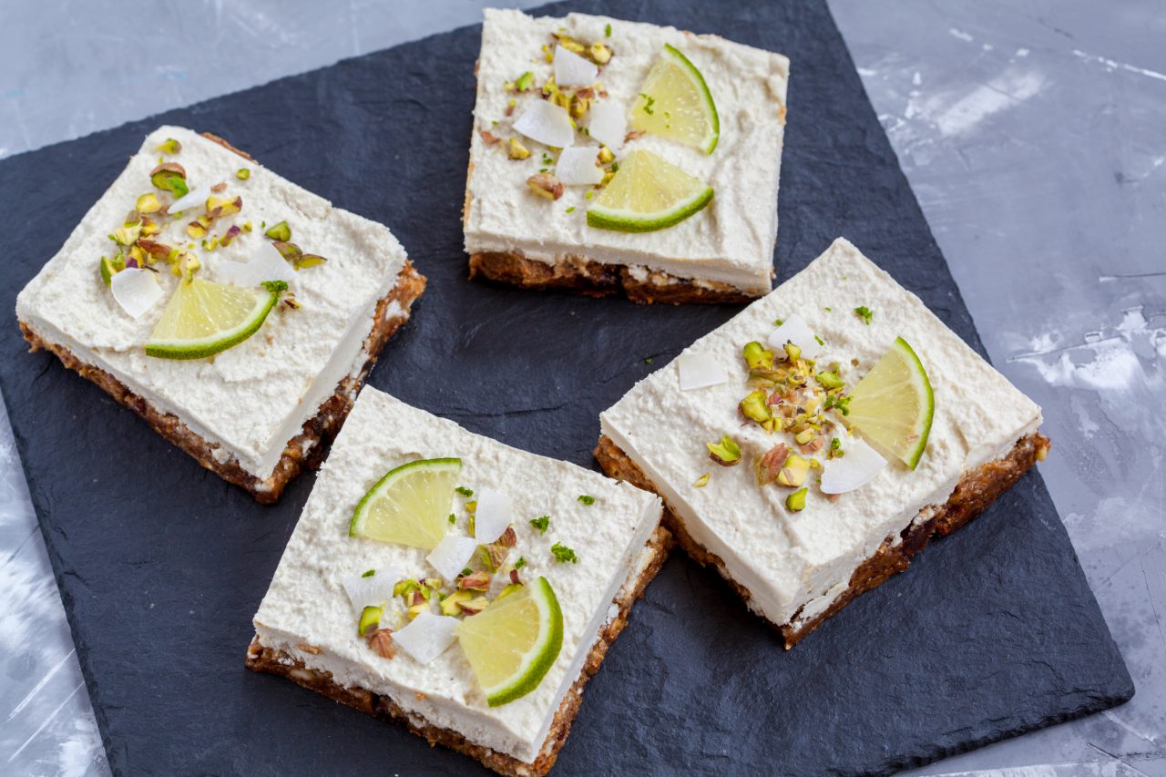 Raw pistachio, coconut and lime cheesecakes. Love for a healthy vegan food concept.