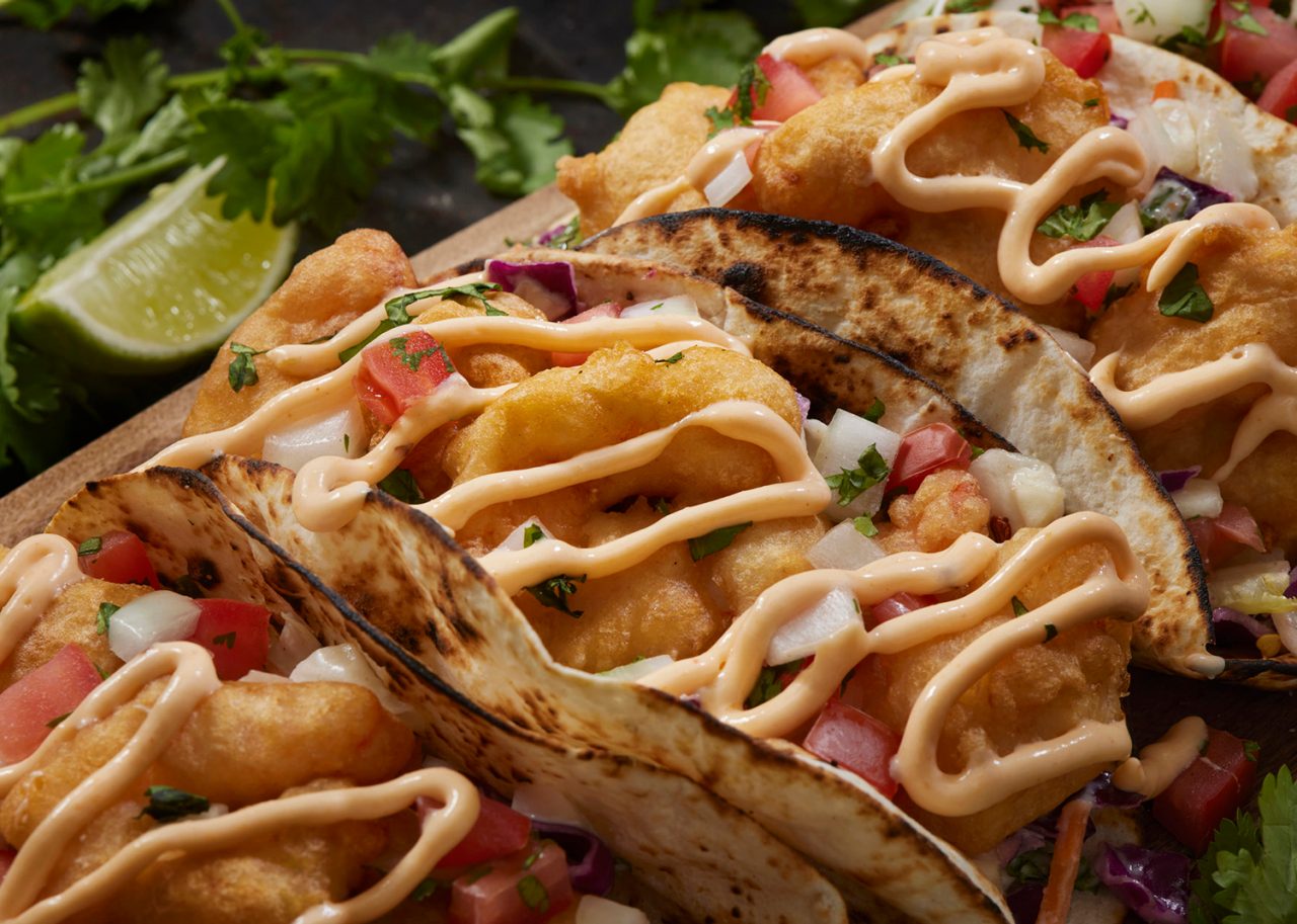 Beer Battered Shrimp Tacos with Creamy Coleslaw, Fresh Salsa and a Spicy Chili Sauce
