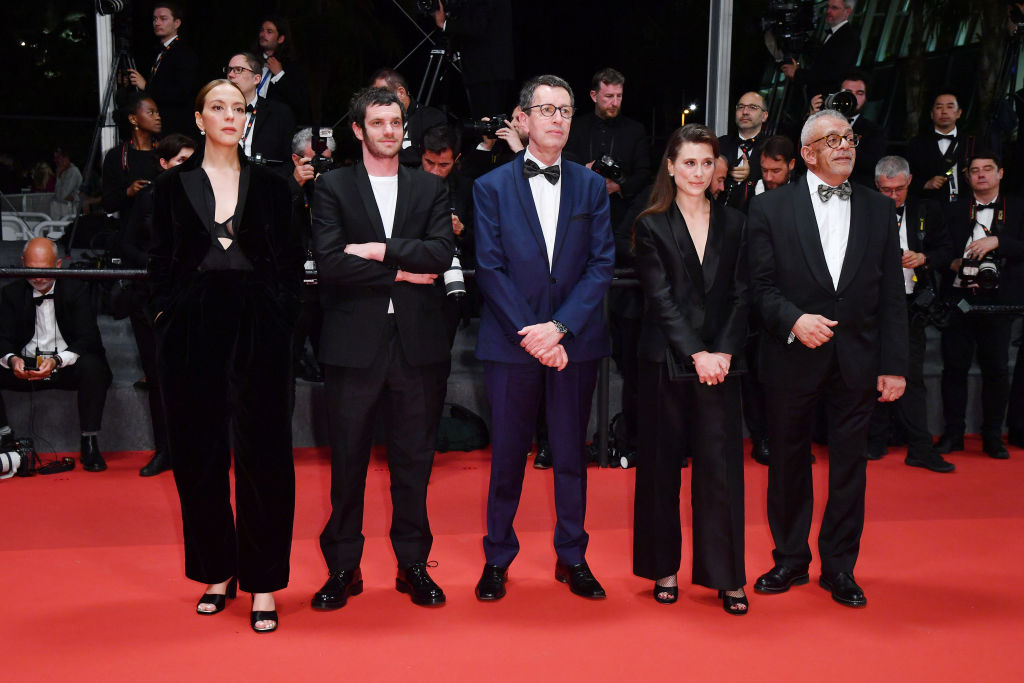 CANNES, FRANCE - MAY 25: Monia Chokri, FÃ©lix Moati, Jean-Claude Raspiengeas, Laura Wandal and Yousry Nasrallah attend the screening of "Stars At Noon" during the 75th annual Cannes film festival at Palais des Festivals on May 25, 2022 in Cannes, France. (Photo by Dominique Charriau/WireImage)