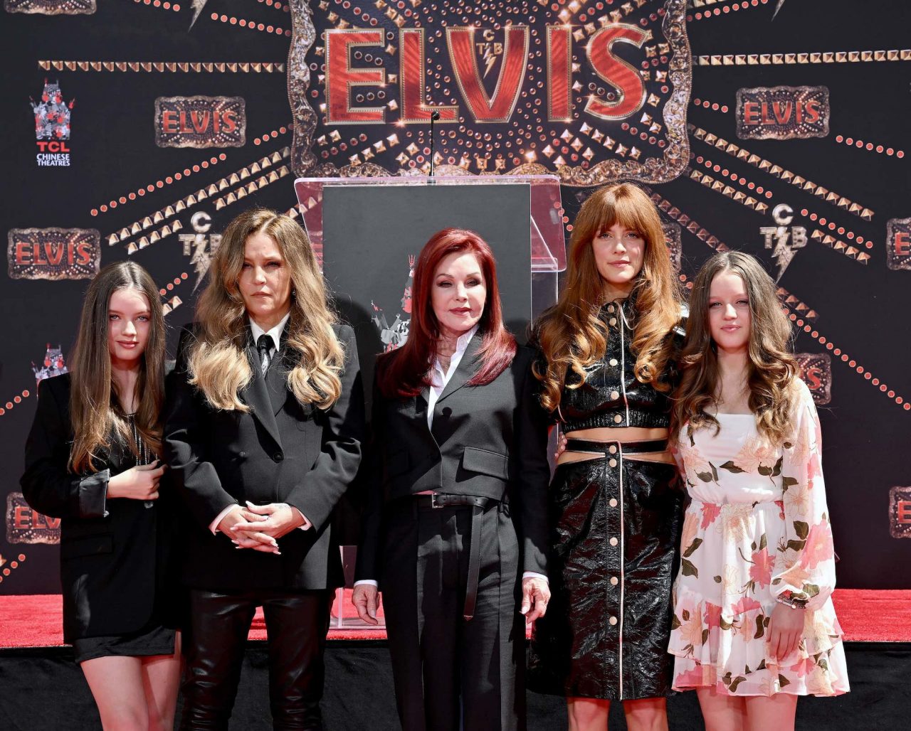 HOLLYWOOD, CALIFORNIA - JUNE 21: (L-R) Harper Vivienne Ann Lockwood, Lisa Marie Presley, Priscilla Presley, Riley Keough, and Finley Aaron Love Lockwood attend the Handprint Ceremony honoring Three Generations of Presley's at TCL Chinese Theatre on June 21, 2022 in Hollywood, California. (Photo by Axelle/Bauer-Griffin/FilmMagic)