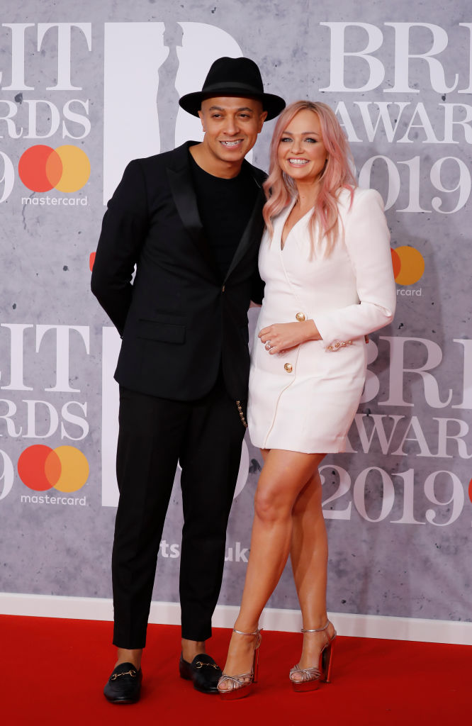 British singer Emma Bunton, member of The Spice Girls, and partnet Jade Jones (L) pose on the red carpet on arrival for the BRIT Awards 2019 in London on February 20, 2019. (Photo by Tolga AKMEN / AFP) / RESTRICTED TO EDITORIAL USE  NO POSTERS  NO MERCHANDISE NO USE IN PUBLICATIONS DEVOTED TO ARTISTS        (Photo credit should read TOLGA AKMEN/AFP via Getty Images)