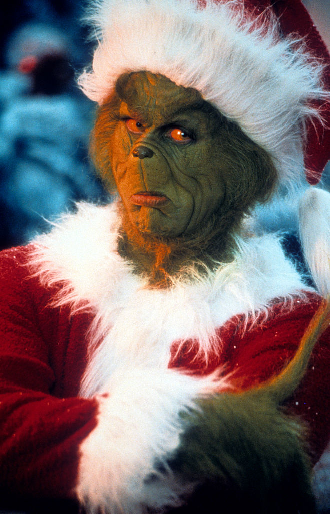 Jim Carrey with arms crossed in a scene from the film 'How The Grinch Stole Christmas', 2000. (Photo by Universal/Getty Images)