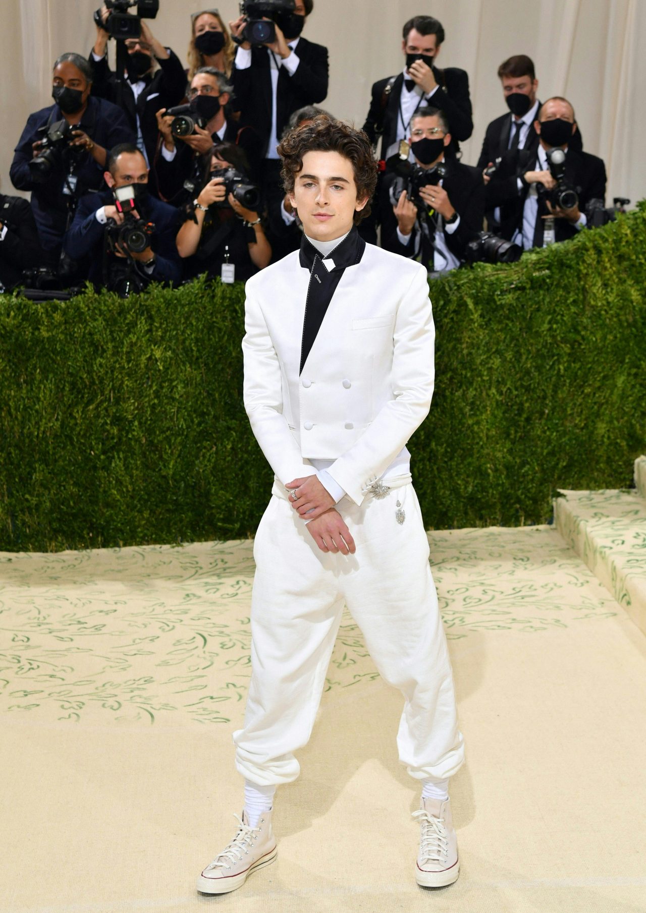 TOPSHOT - US-French actor Timothee Chalamet arrives for the 2021 Met Gala at the Metropolitan Museum of Art on September 13, 2021 in New York. - This year's Met Gala has a distinctively youthful imprint, hosted by singer Billie Eilish, actor Timothee Chalamet, poet Amanda Gorman and tennis star Naomi Osaka, none of them older than 25. The 2021 theme is "In America: A Lexicon of Fashion." (Photo by ANGELA  WEISS / AFP) (Photo by ANGELA  WEISS/AFP via Getty Images)