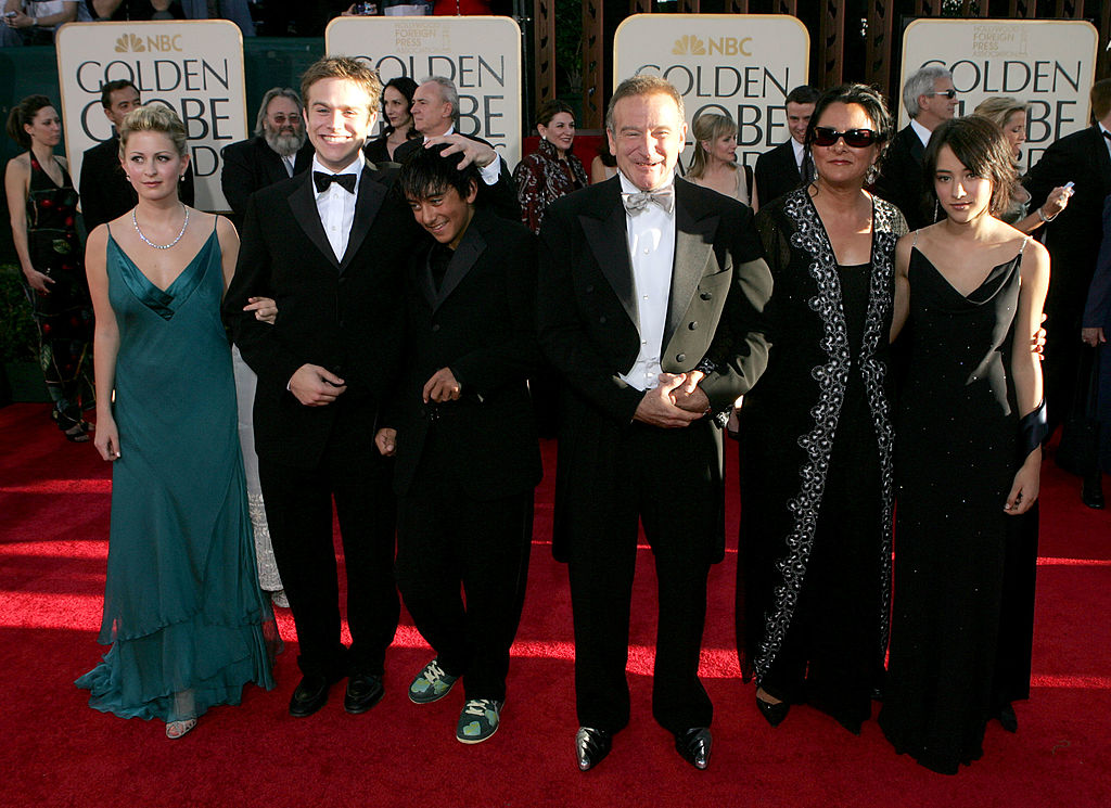BEVERLY HILLS, CA - JANUARY 16:  Actor Robin Williams and wife Marsha Garces Williams, sons Cody, Zachary with girlfriend Alex, daughter Zelda arrive at the 62nd Annual Golden Globe Awards at the Beverly Hilton Hotel January 16, 2005 in Beverly Hills, California. (Photo by Kevin Winter/Getty Images)