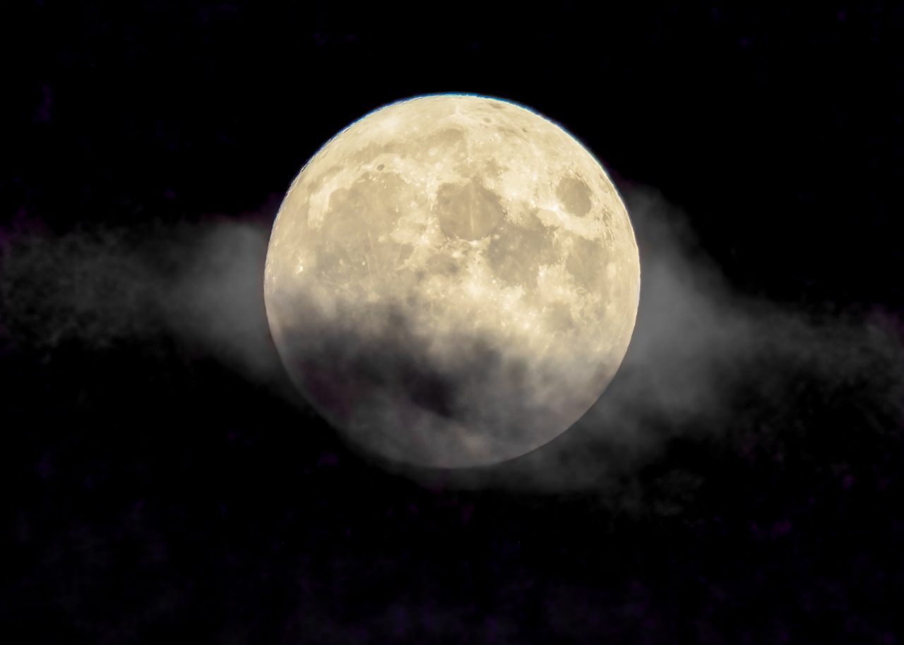 Boise, ID, USA - August 21, 2021:  August full moon also known as Sturgeon Moon rises over Boise Idaho sky.