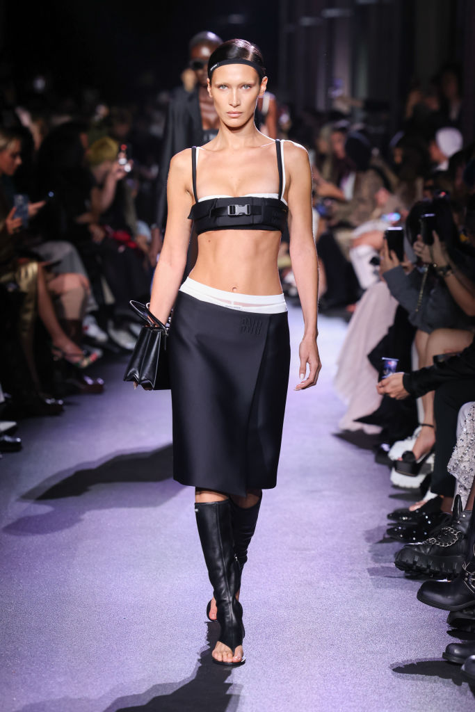 PARIS, FRANCE - OCTOBER 04: (EDITORIAL USE ONLY - For Non-Editorial use please seek approval from Fashion House) Bella Hadid walks the runway during the Miu Miu Womenswear Spring/Summer 2023 show as part of Paris Fashion Week on October 4, 2022 in Paris, France. (Photo by Victor Boyko/Getty Images)