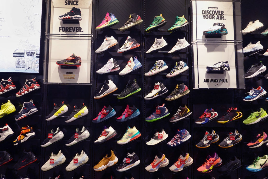 CHICAGO, ILLINOIS - AUGUST 02: Athletic footwear is offered for sale at a Foot Locker store on August 02, 2021 in Chicago, Illinois.  Foot Locker Inc. has announced plans to buy athletic retailer WSS for $750 million and Atmos, a Japan-based streetwear and sneaker company, for $360 million.  (Photo by Scott Olson/Getty Images)