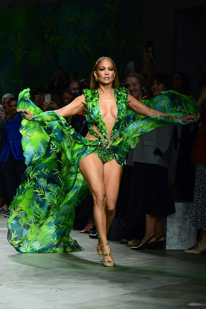 US singer Jennifer Lopez presents a creation for Versace's Women's Spring Summer 2020 collection in Milan on September 20, 2019. (Photo by Miguel MEDINA / AFP)        (Photo credit should read MIGUEL MEDINA/AFP via Getty Images)