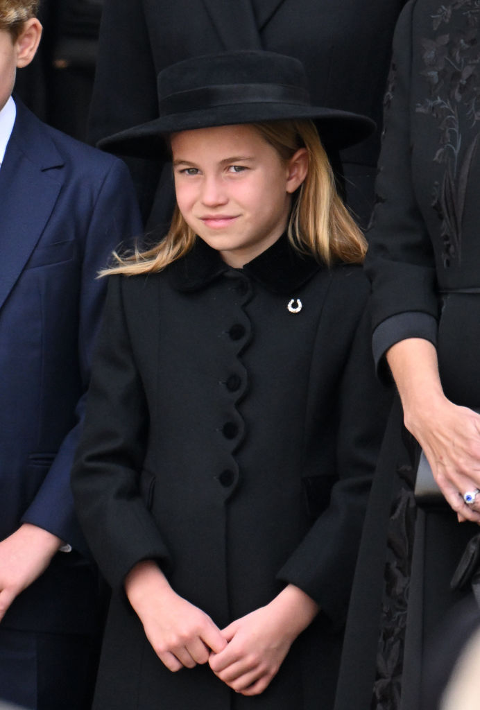 LONDON, ENGLAND - SEPTEMBER 19: Princess Charlotte of Wales during the State Funeral of Queen Elizabeth II at Westminster Abbey on September 19, 2022 in London, England. Elizabeth Alexandra Mary Windsor was born in Bruton Street, Mayfair, London on 21 April 1926. She married Prince Philip in 1947 and ascended the throne of the United Kingdom and Commonwealth on 6 February 1952 after the death of her Father, King George VI. Queen Elizabeth II died at Balmoral Castle in Scotland on September 8, 2022, and is succeeded by her eldest son, King Charles III. (Photo by Karwai Tang/WireImage)