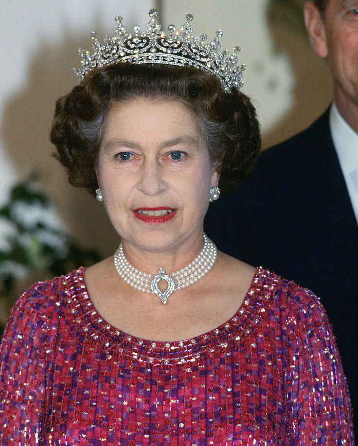 BANGLADESH - NOVEMBER 16:  Queen Elizabeth II wears a four strand diamond and pearl choker with 'Granny's Tiara' to an engagement in Bangladesh.  (Photo by Tim Graham Photo Library via Getty Images)