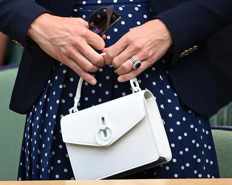 LONDON, ENGLAND - JULY 02: Catherine, Duchess of Cambridge, bag detail, attends the Wimbledon Tennis Championships at the All England Lawn Tennis and Croquet Club on July 02, 2021 in London, England. (Photo by Karwai Tang/WireImage)