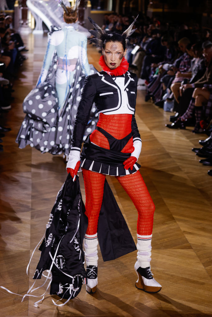 PARIS, FRANCE - OCTOBER 03: (EDITORIAL USE ONLY - For Non-Editorial use please seek approval from Fashion House) Bella Hadid walks the runway during the Thom Browne Womenswear Spring/Summer 2023 show as part of Paris Fashion Week at Palais Garnier on October 03, 2022 in Paris, France. (Photo by Richard Bord/Getty Images)