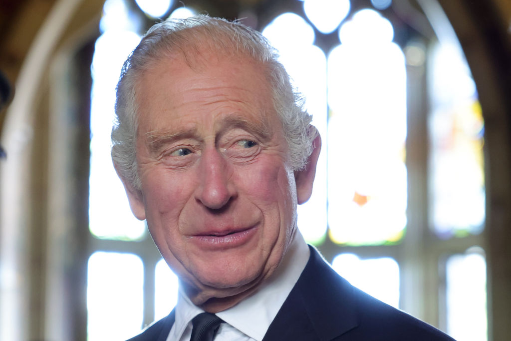 CARDIFF, WALES - SEPTEMBER 16: King Charles III speaks to the wives of victims of the Aberfan disaster at a reception for local charities at Cardiff Castle on September 16, 2022 in Cardiff, Wales. King Charles III is visiting Wales for the first time since ascending the throne following the death of his mother, Queen Elizabeth II, who died at Balmoral Castle on September 8, 2022. (Photo by Chris Jackson/Getty Images)