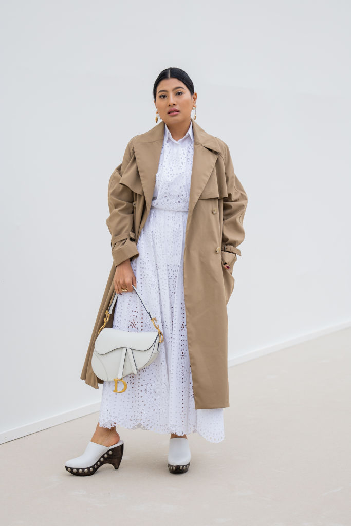 PARIS, FRANCE - SEPTEMBER 27: Princess of Thailand Sirivannavari Nariratana Rajakanya wears beige coat, white laced skirt and button shirt, bag outside Dior during Paris Fashion Week - Womenswear Spring/Summer 2023 : Day Two on September 27, 2022 in Paris, France. (Photo by Christian Vierig/Getty Images)