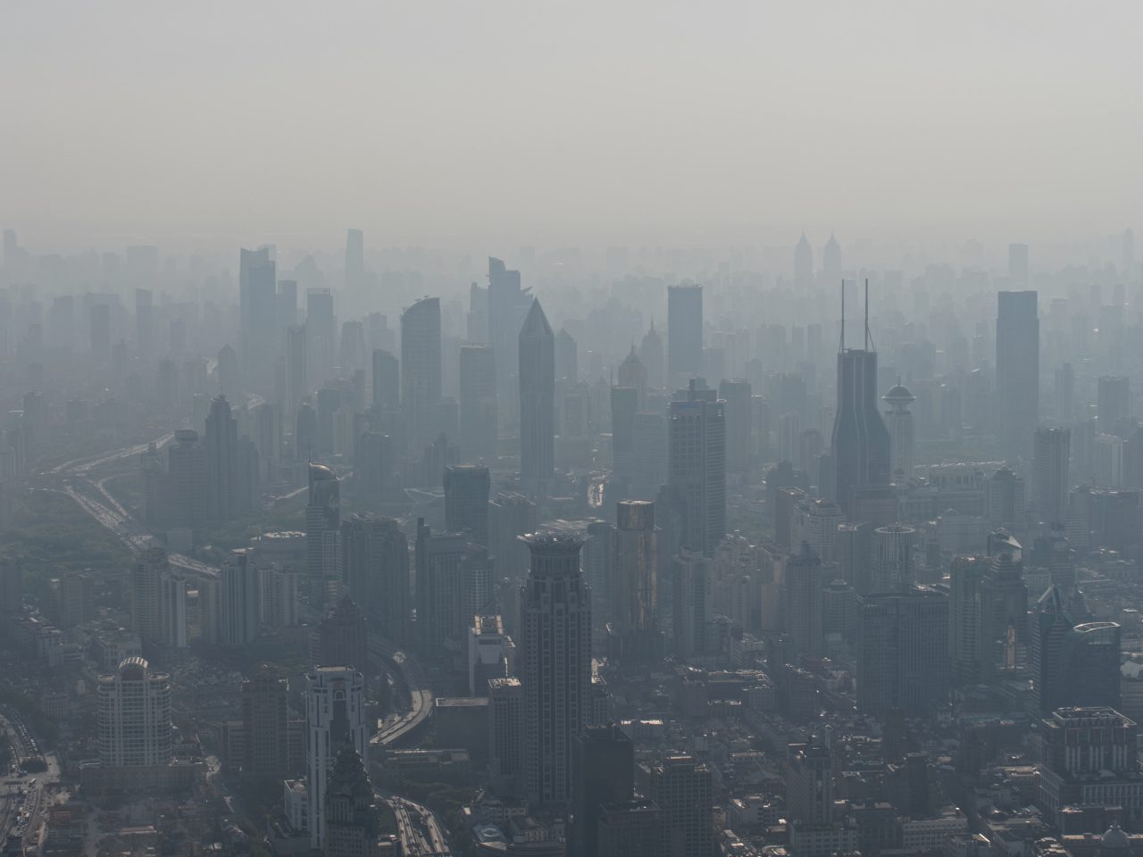 Aerial view of Shanghai city in fog, air pollution is a serious environment problem in China.
